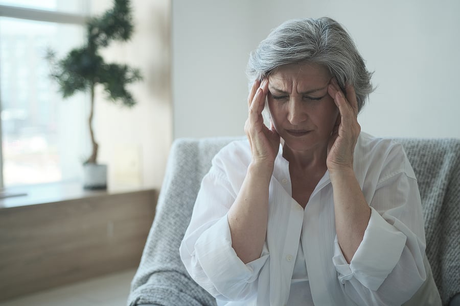 bigstock-Sad-Sick-Elderly-Woman-With-He-432429962